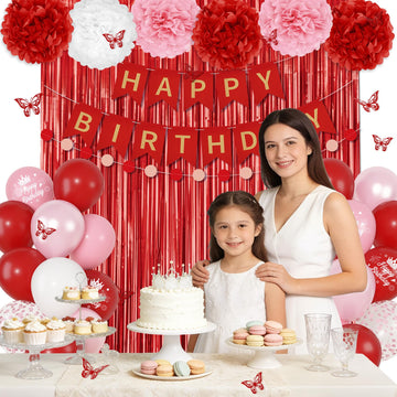 Ouddy Party circle banner frames the cake table