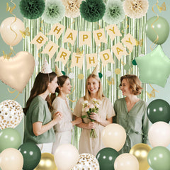 Ouddy Party sage green pompoms add playful texture.