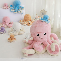 OUKEYI octopus plush blue face closeup, charming eyes for cuddle moments