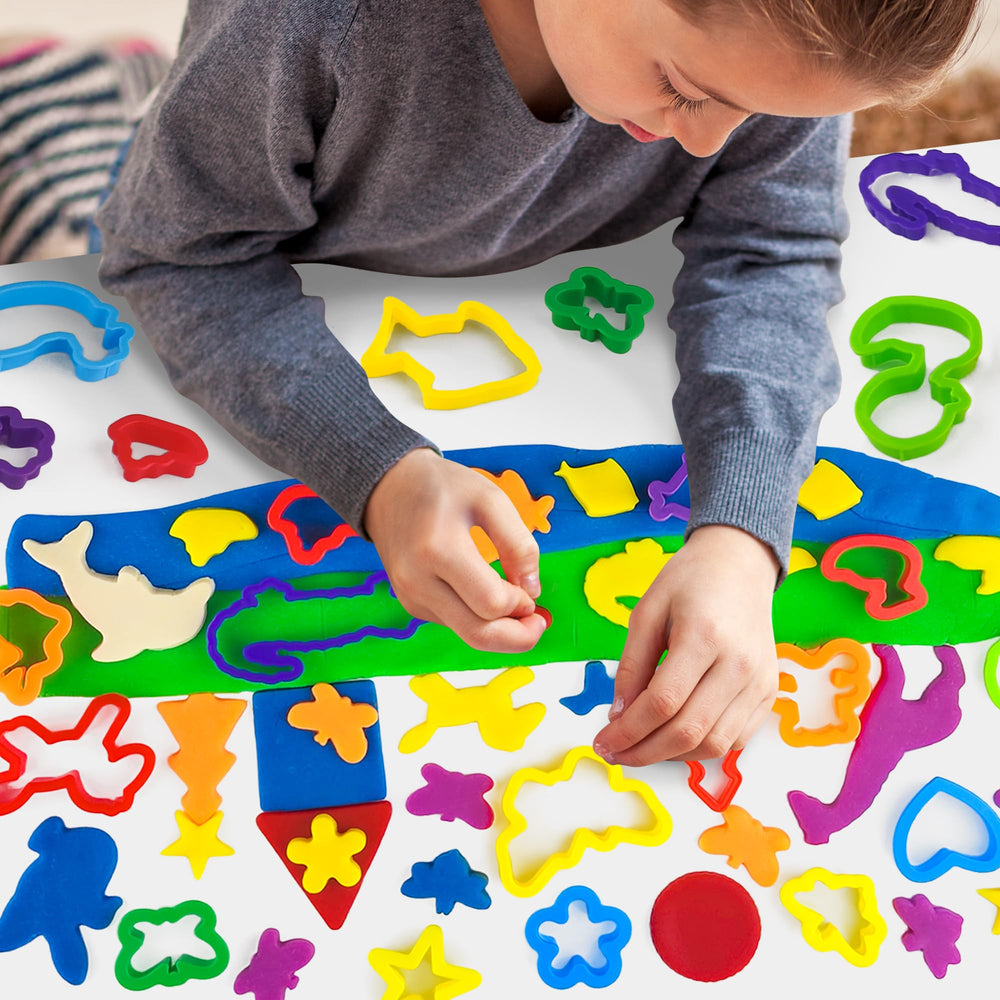 Bright-colors of Oun Nana dough tools invite creative storytelling and pretend play.