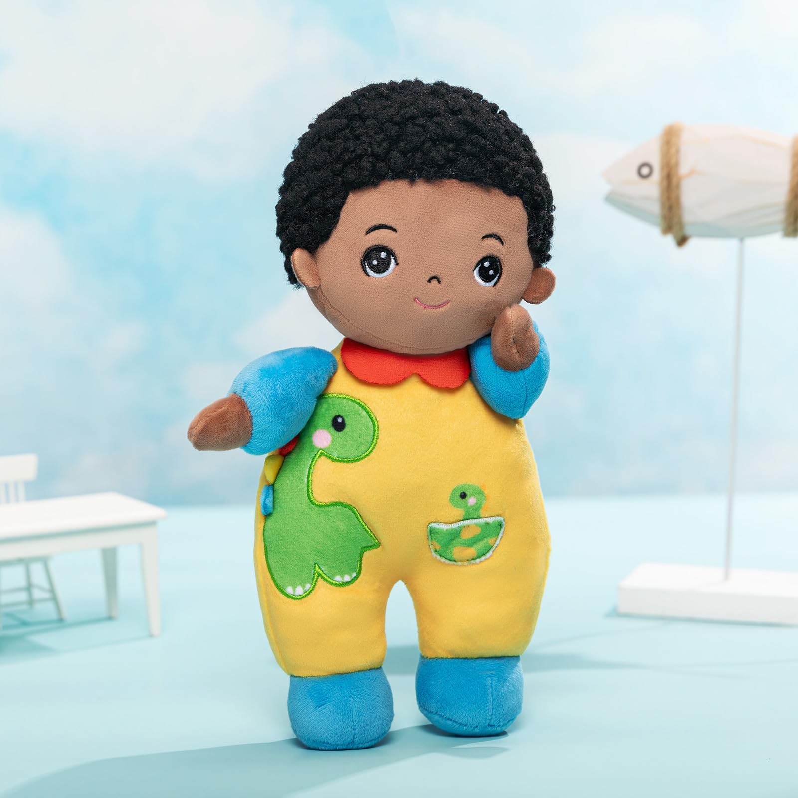 OUOZZZ dinosaur-themed play inspiration with the soft baby doll.