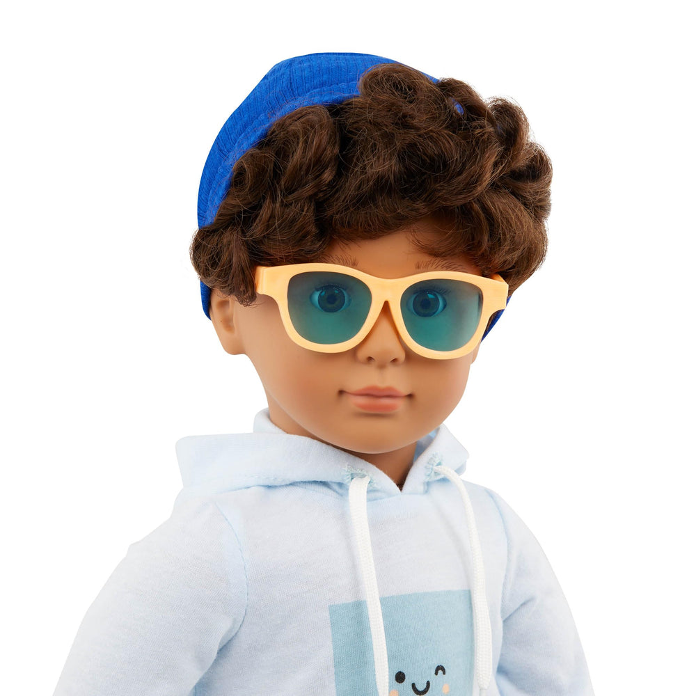 Our Generation Milo shoes sunglasses and beanie for complete travel outfits