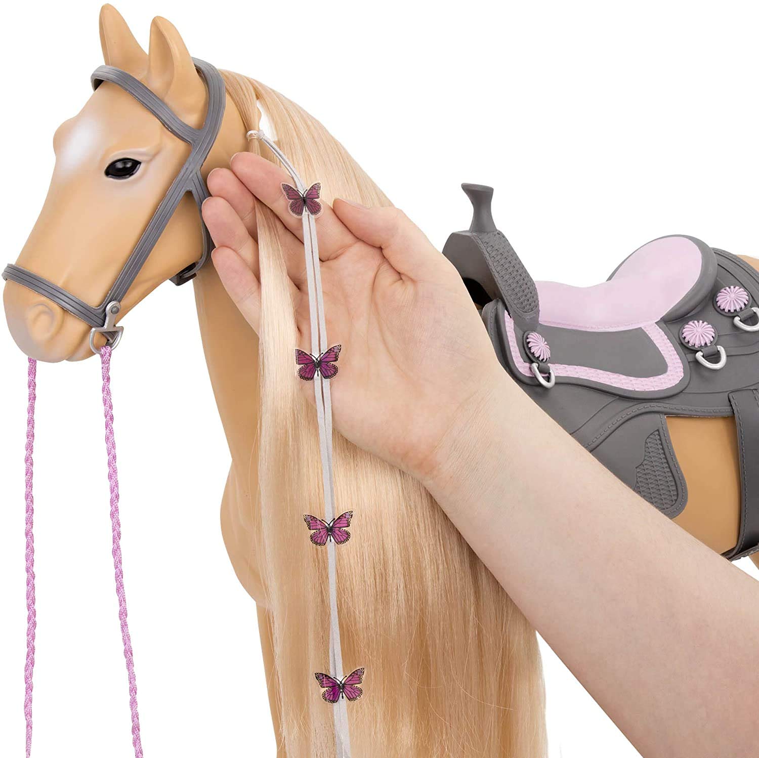 Our Generation Palomino paint horse round-tipped brush ready for grooming.