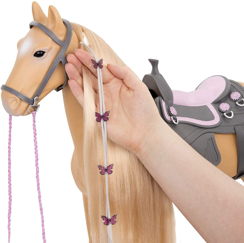 Our Generation Palomino paint horse round-tipped brush ready for grooming.