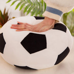 Pillow-form plush offers versatile use as a seat cushion or decor accent.