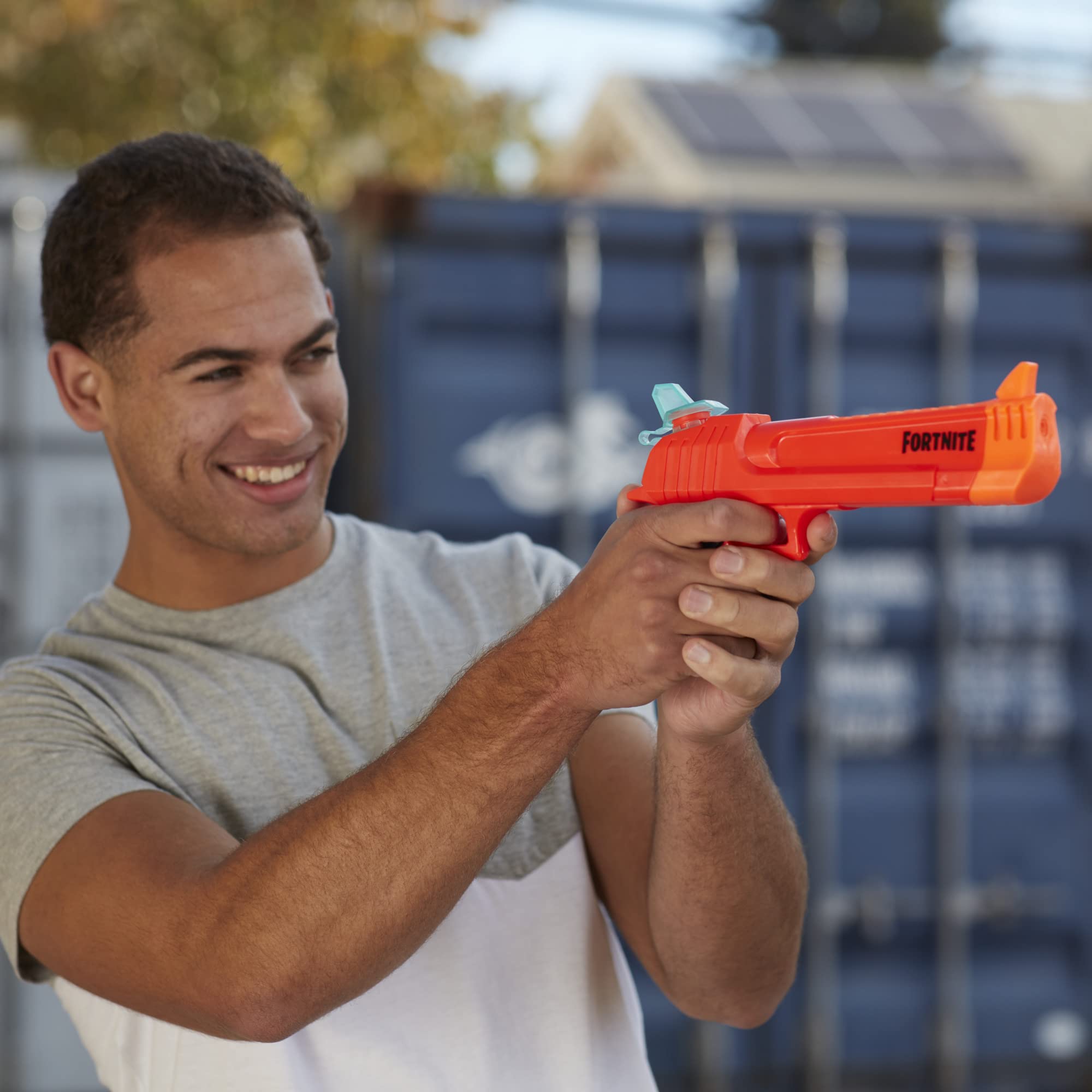 Teens and adults enjoy outdoor summer battles with Fortnite flair