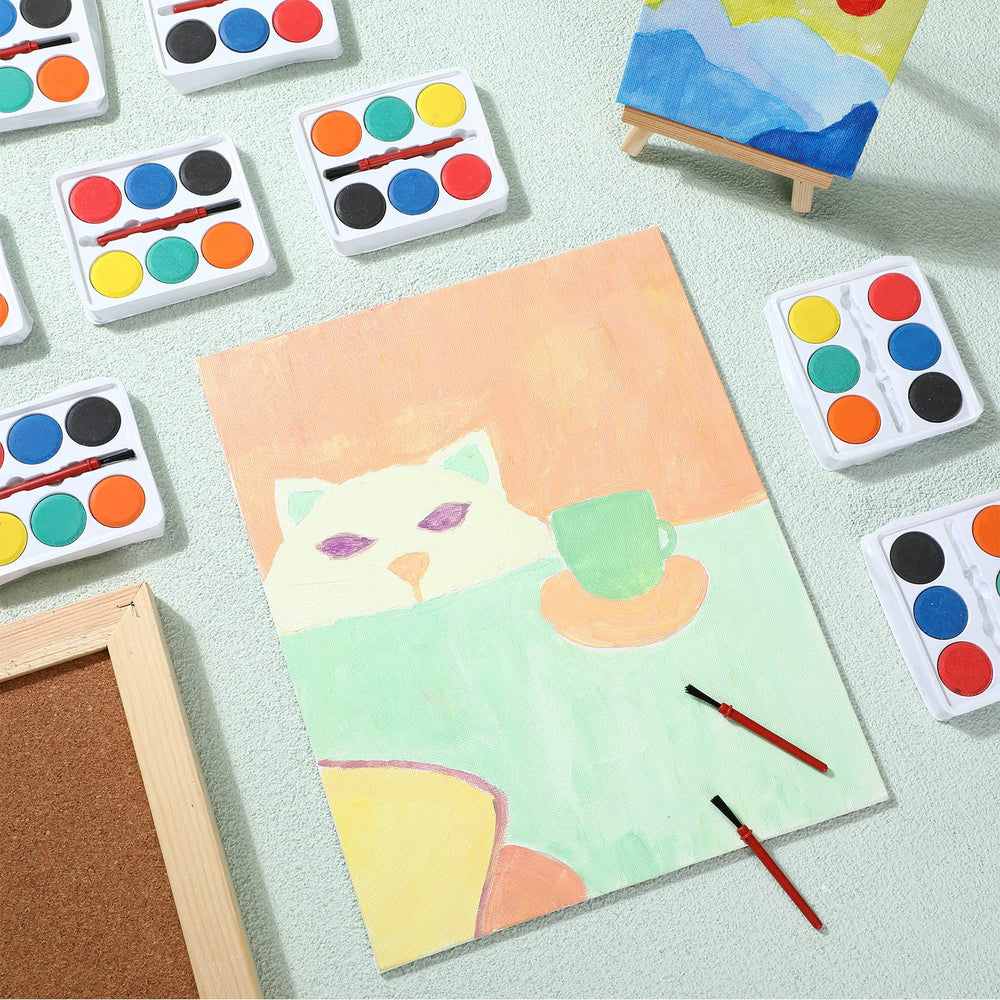 Outus durable, washable watercolor palette and brush for quick cleanup.