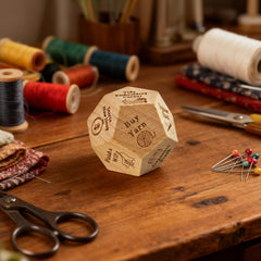 Oyeftp Quilter's Dice shown in a sewing circle, energizing group creativity.