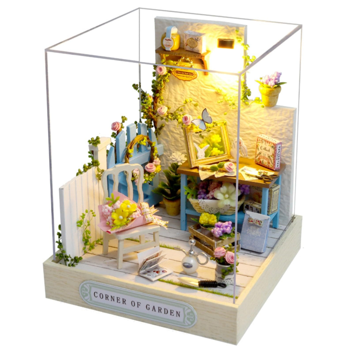 OZJAY miniature house with dust-proof cover protecting the display.