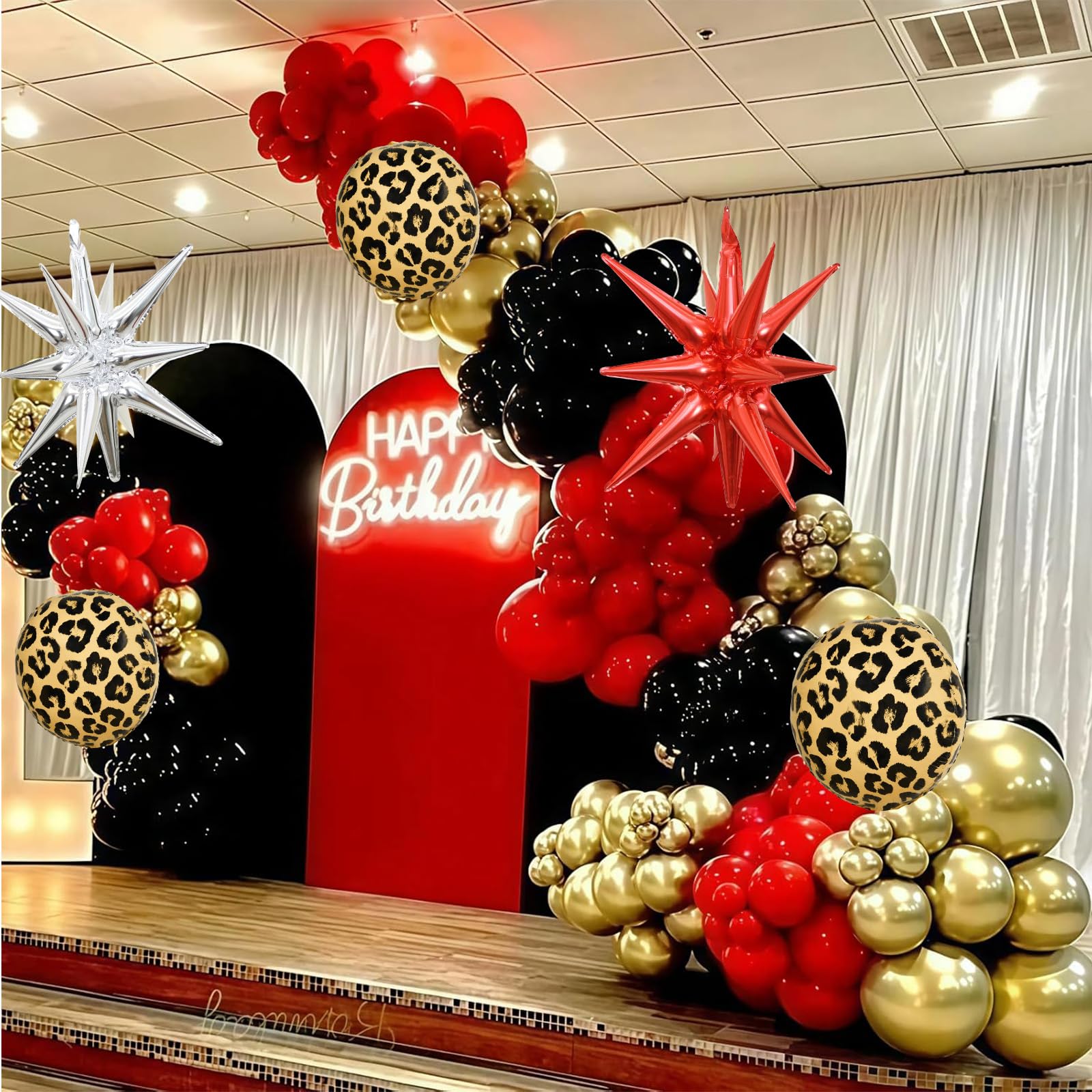 Paayeq 18-inch black balloons create striking contrast.