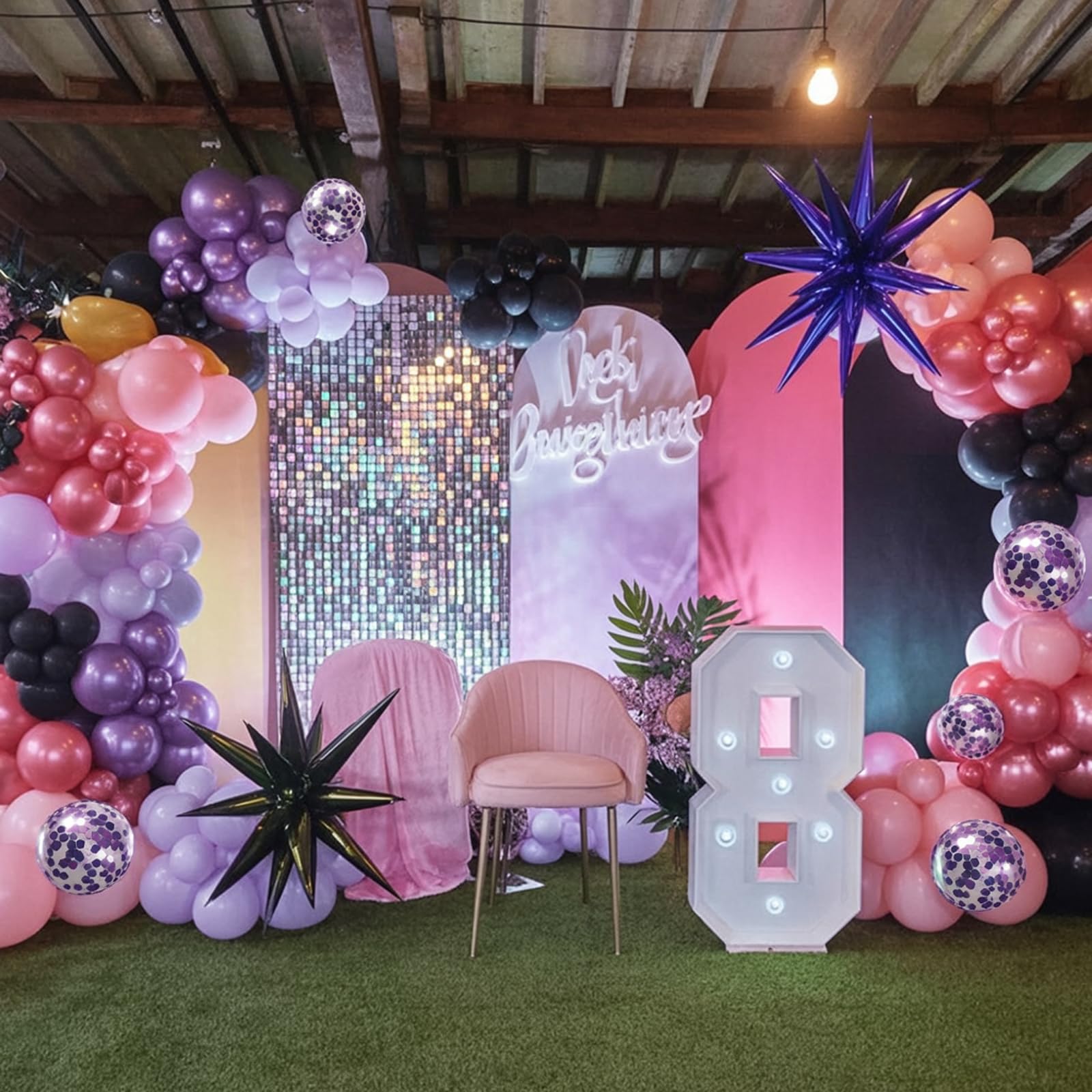 Paeyeq black 18-inch balloon adds elegant contrast to setup.
