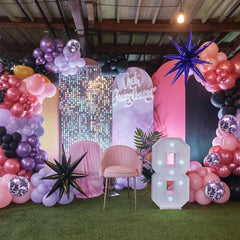 Paeyeq black 18-inch balloon adds elegant contrast to setup.