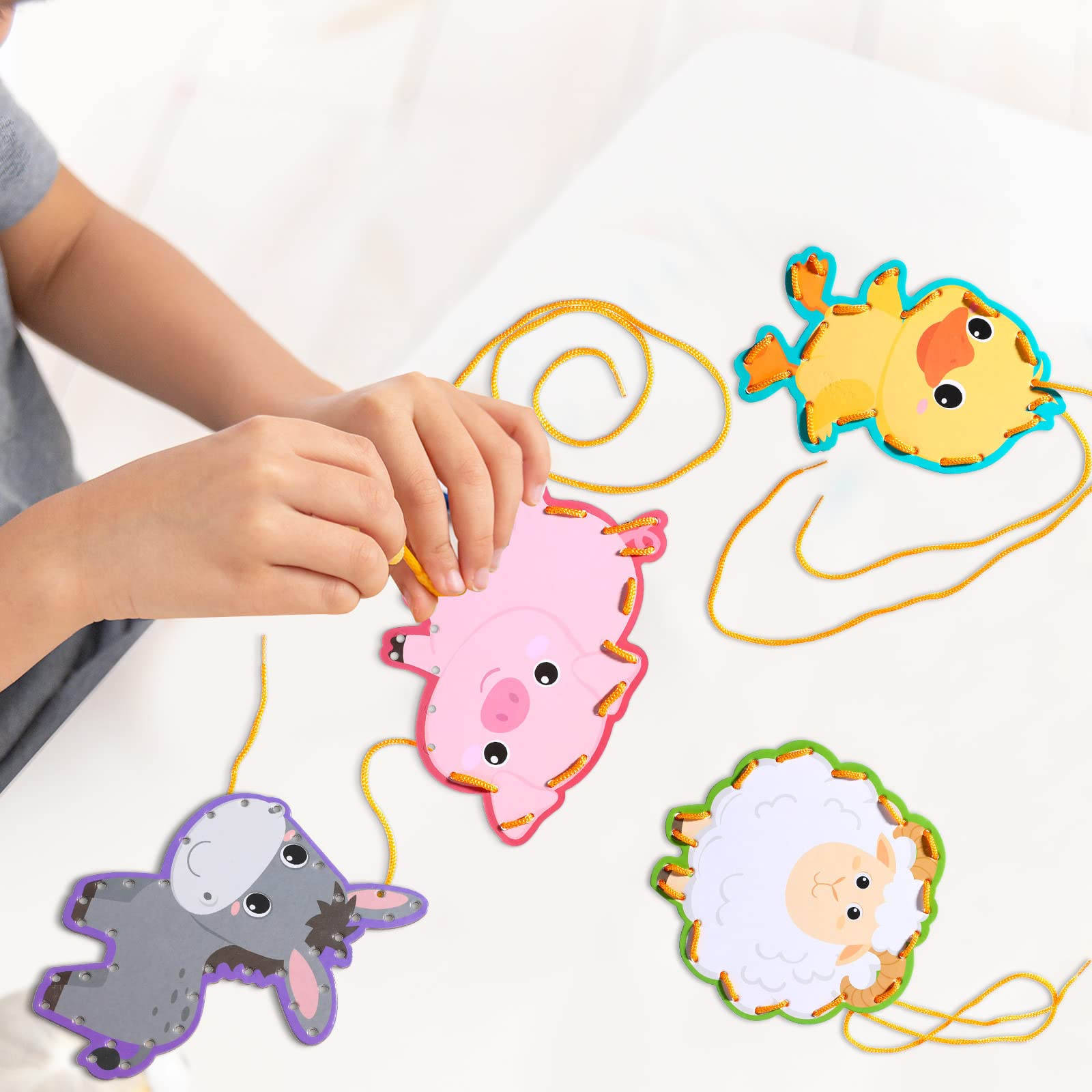 Pajean 4-foot laces unlock longer tracing paths for collaborative family activities.
