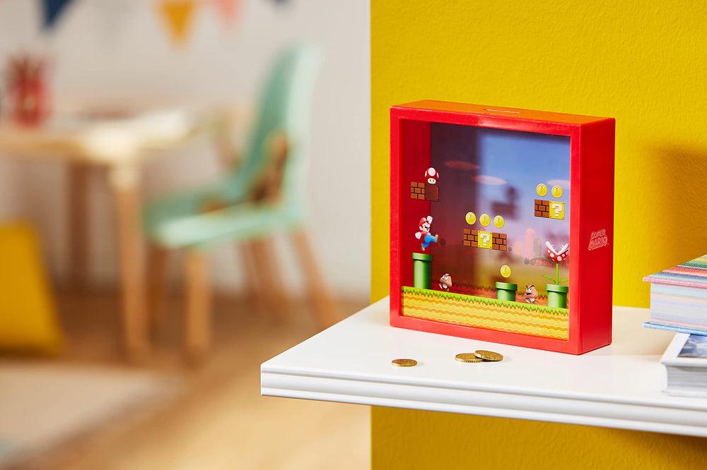 Close-up of Goomba design on Paladone Mario Money Box for nostalgic display.