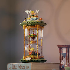 PANTASY Little Prince hourglass celestial-theme creates a dreamy focal point on a shelf.
