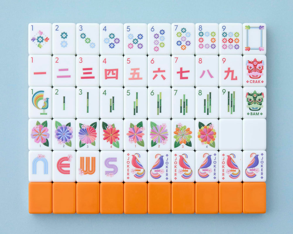 Paradise Mahjong Tiles front design with a vibrant orange back for stylish game nights.