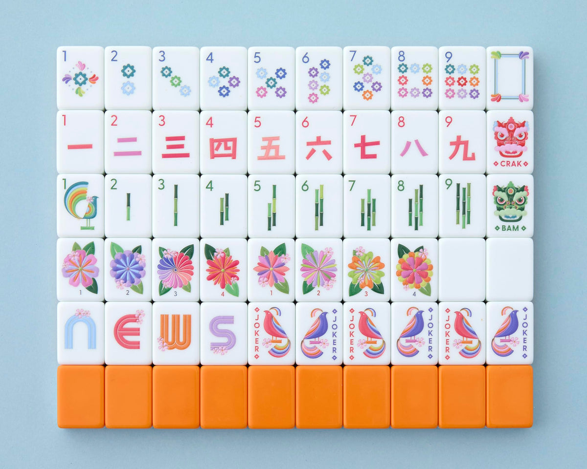 Paradise Mahjong Tiles front design with a vibrant orange back for stylish game nights.