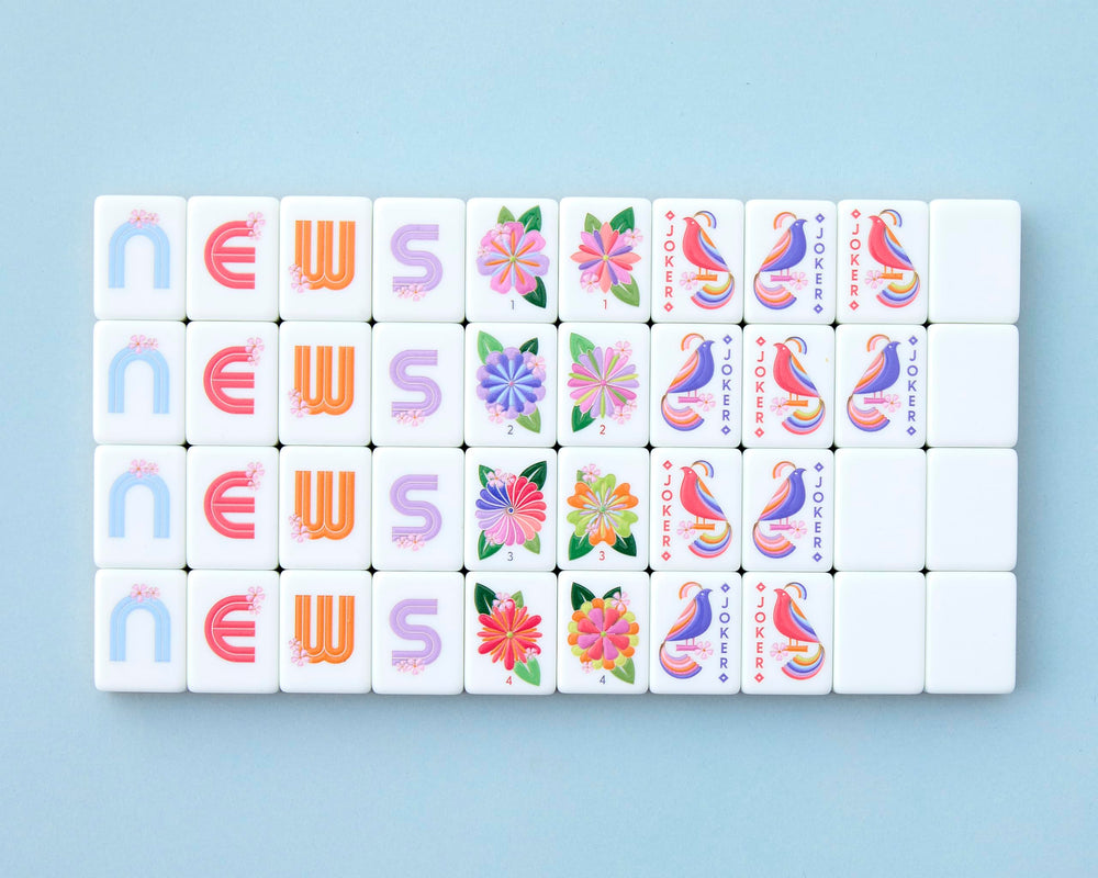 Paradise set contents reveal 160 tiles and included organizers for tidy gameplay.