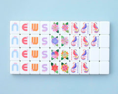 Paradise set contents reveal 160 tiles and included organizers for tidy gameplay.