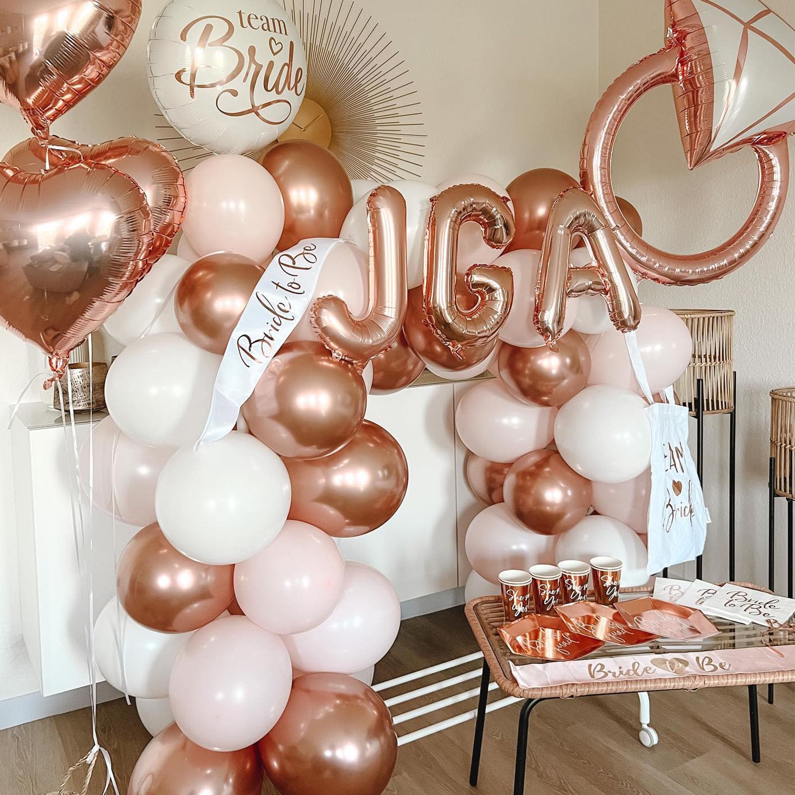 Paready matte white balloons provide soft backdrops for baby showers