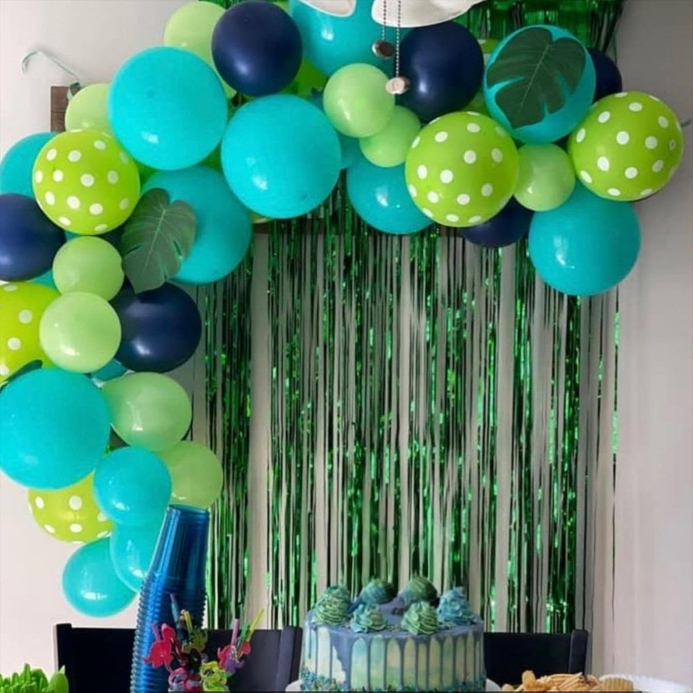 Paready teal blue balloons complement teal accents and arches