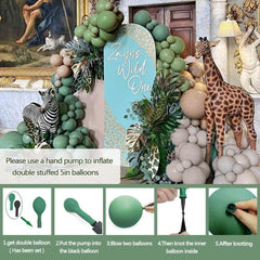 Dinosaur balloon arch accents elevate jungle-themed parties