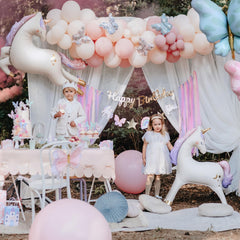 PartyDeco matte white unicorn balloon reduces glare in photos.