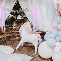 PartyDeco 34-inch unicorn balloon stands upright, quick decor solution.