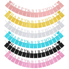 PartyHooman Sweet 16 banner complements rose gold party styling.