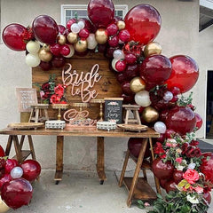 PartyWoo 100-pack burgundy balloons maximize large-venue decorating options.