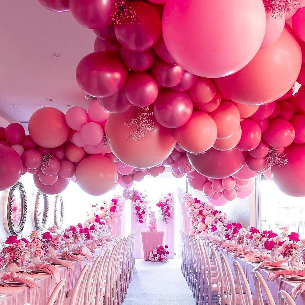 PartyWoo 12-inch magenta balloons creating a vivid backdrop