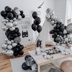 PartyWoo matte black balloons filled with air last up to 72 hours.