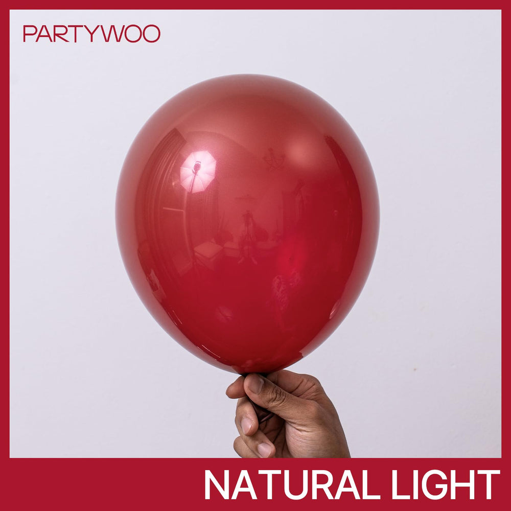 PartyWoo arch garland created with burgundy balloons for elegant backdrops.