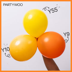 PartyWoo orange arch kit balloons create a striking entryway backdrop