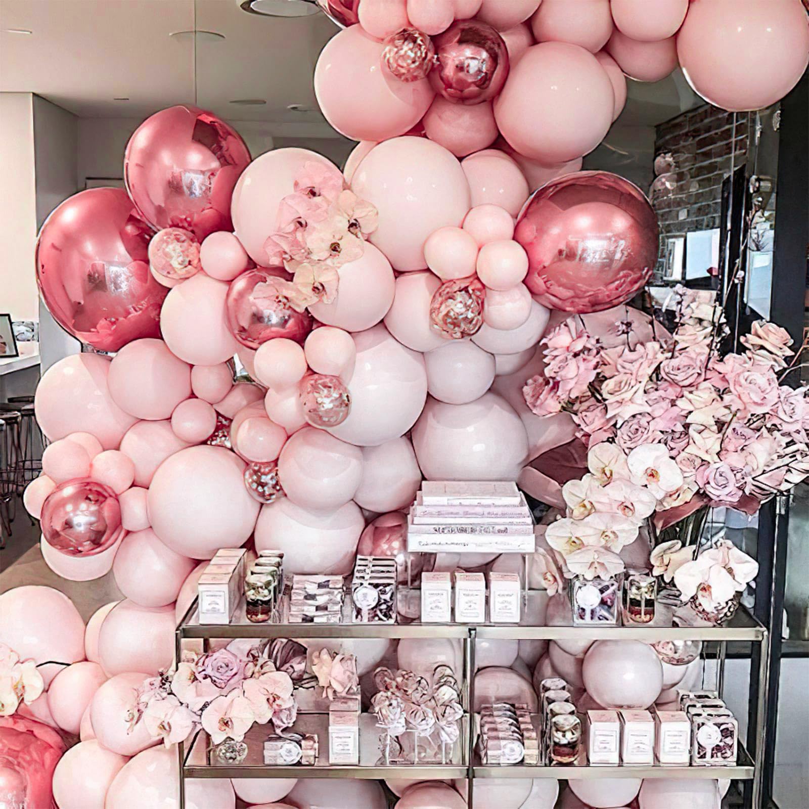 PartyWoo Baby Shower Decor Ideas with pale pink balloons for photo backdrops.