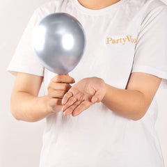 PartyWoo balloon garland idea shows silver balloons for elegant arches