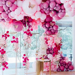 PartyWoo balloon setup idea for engagement party with coordinated pink hues