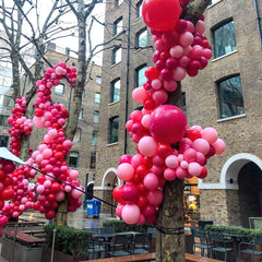 Air-filled setup showing 3-6 hour helium float for PartyWoo balloons.