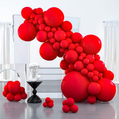PartyWoo 36-inch red balloon used as a dramatic entrance focal point