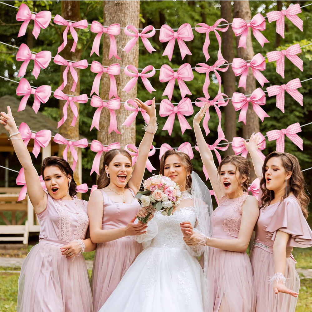 Pasimy pink bow garland ideal for baby showers, weddings, and gatherings