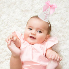 PATRDIO pink bow white-base crown adds cohesive party styling