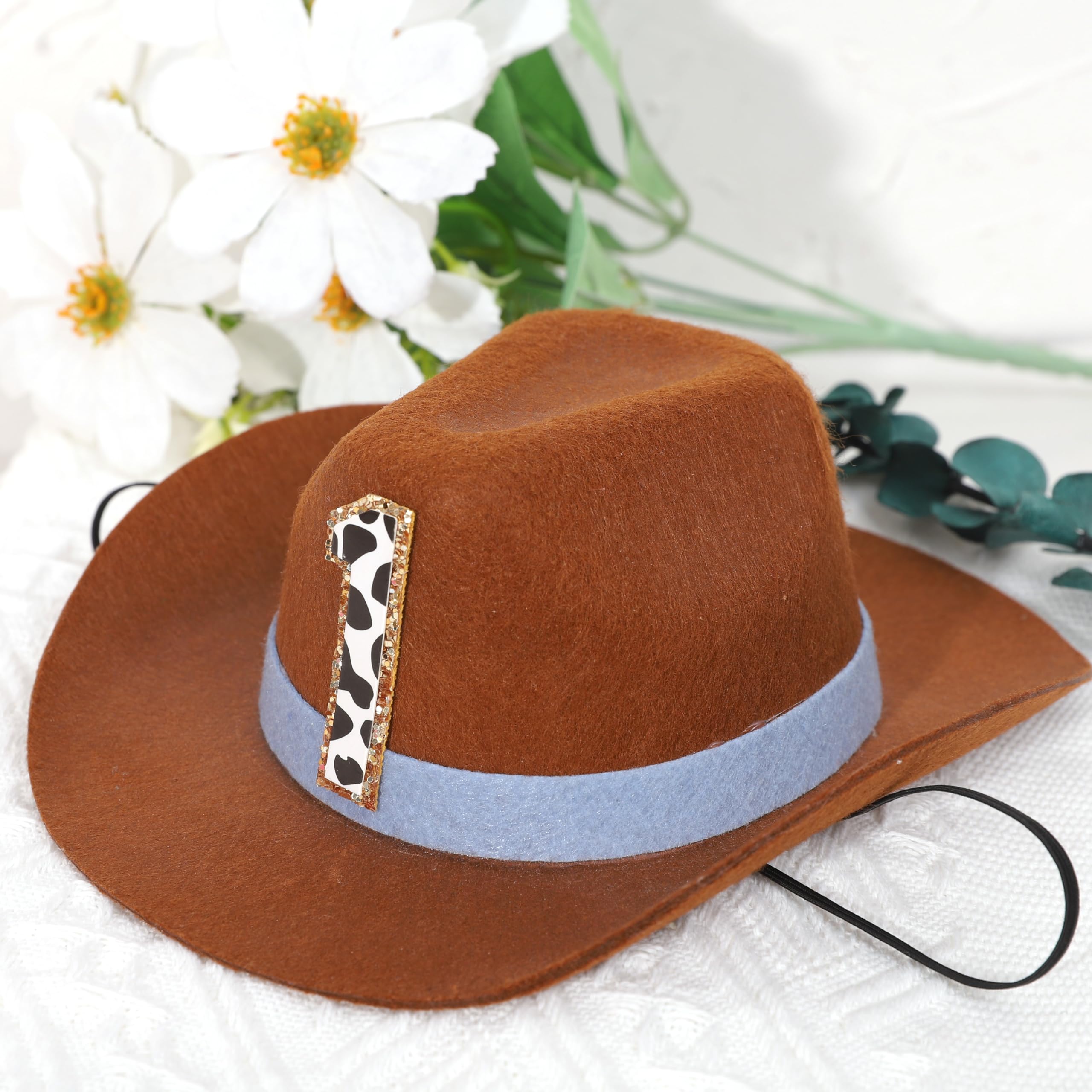 PATRDIO Cowboy 1st Birthday Hat blue on table, great party décor prop.