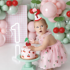 PATRDIO pink felt birthday crown adds sweet charm.