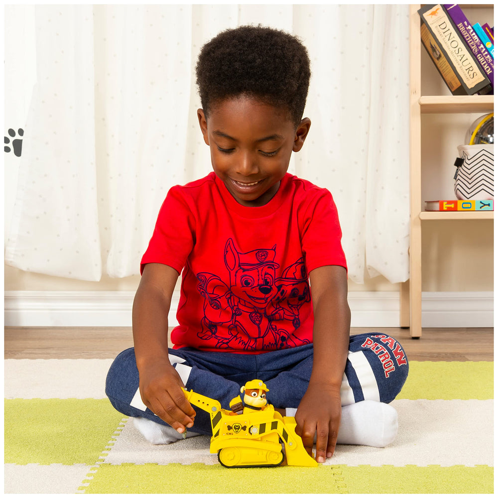 Movable drill on Rubble's bulldozer enhances interactive pretend rescues