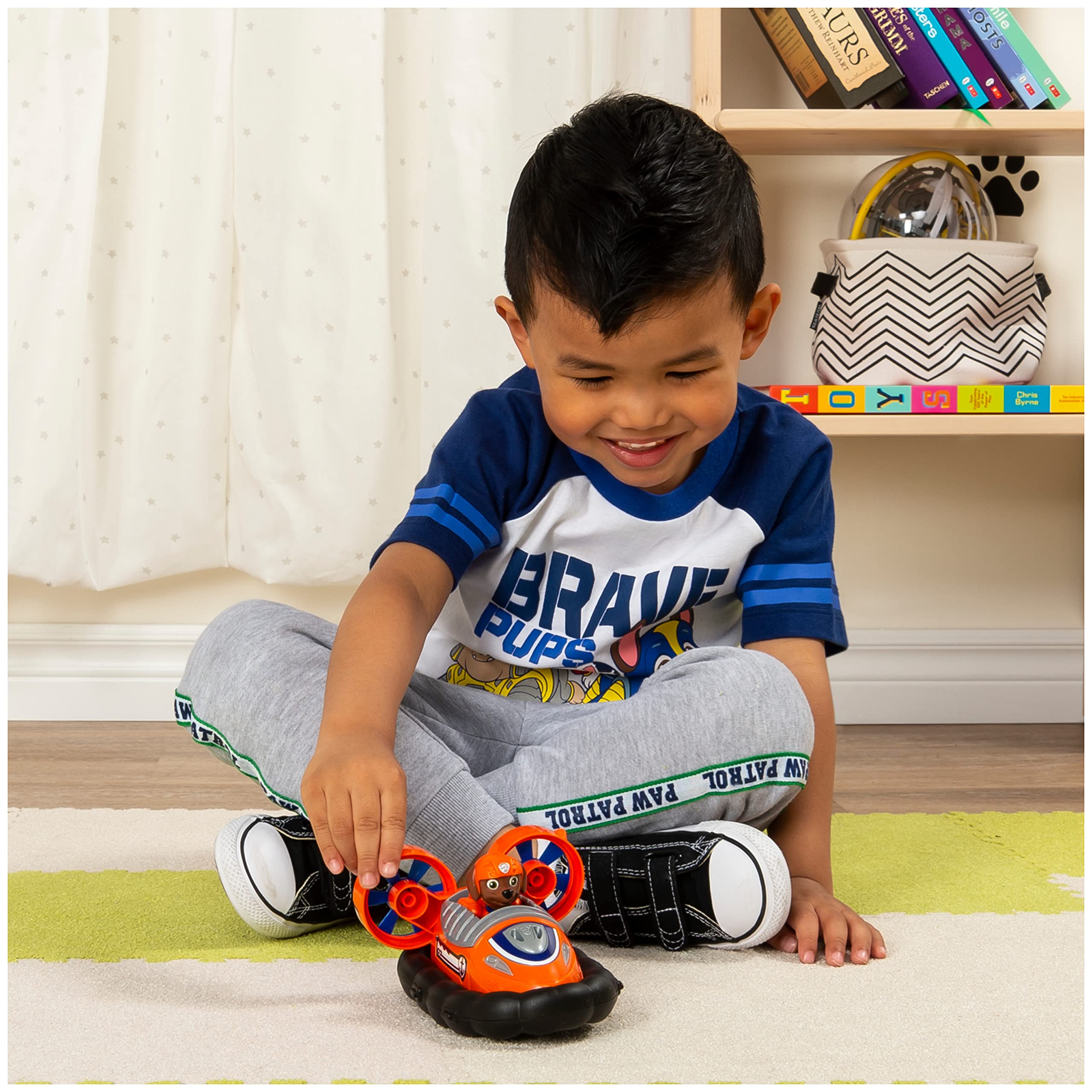 Zuma's Hovercraft wheels and spinning fans in action during playtime.