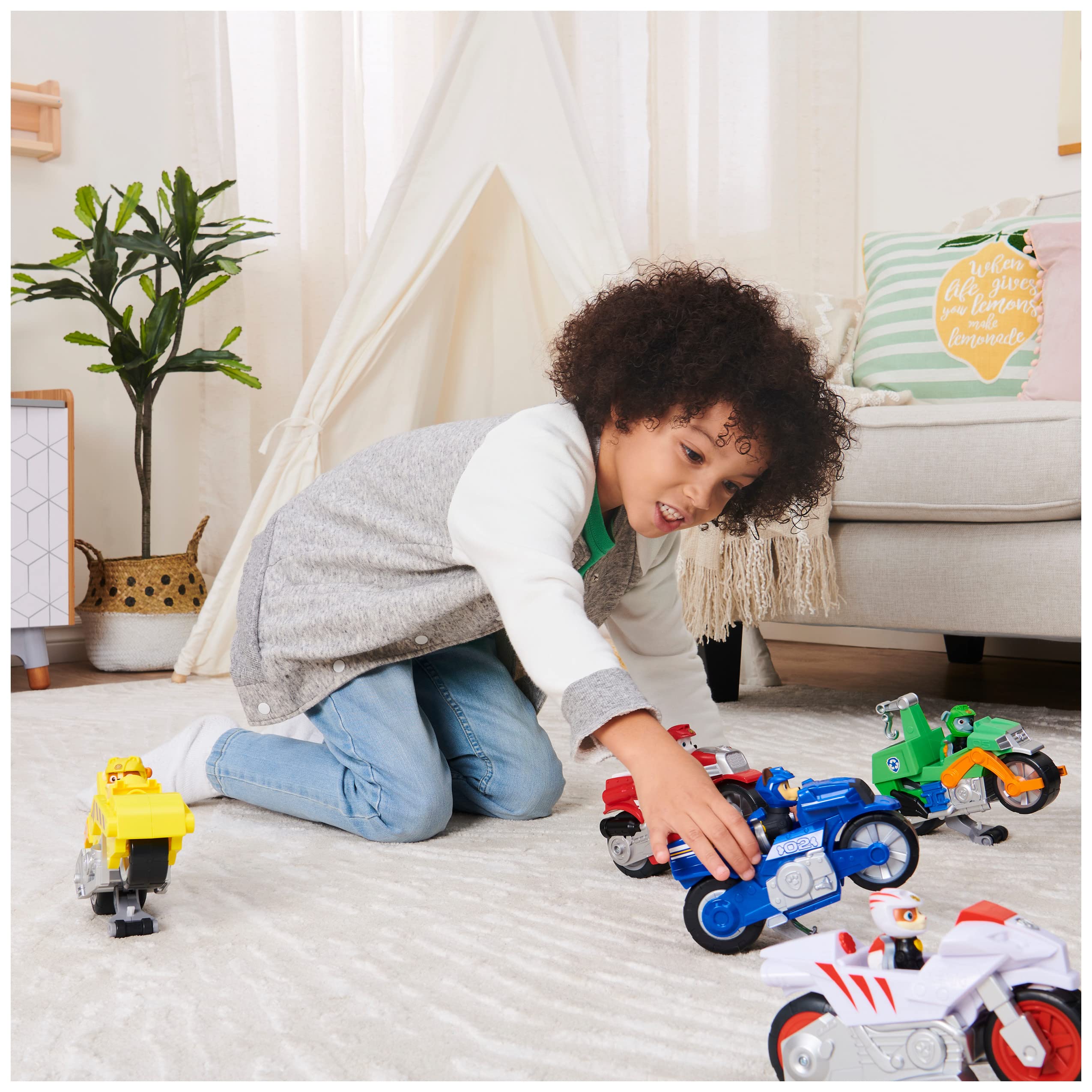 Deluxe vehicle close-up shows authentic graphics and large wheels for smooth rolling.