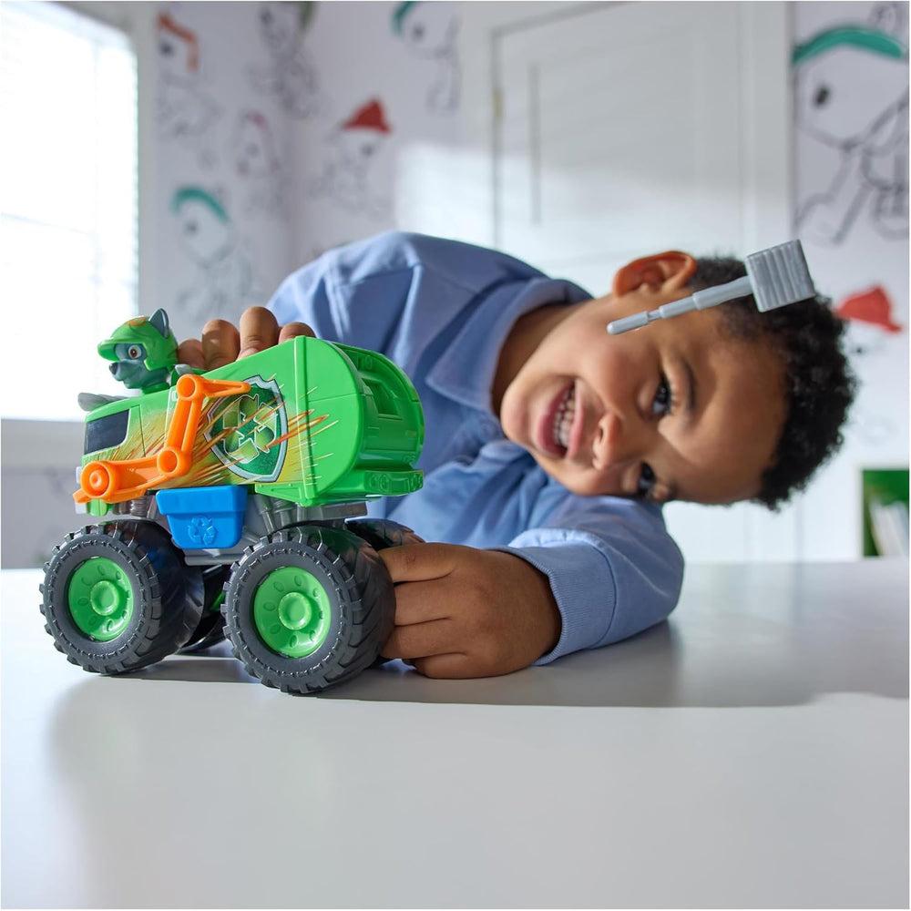 Imaginative rescue mission scene with Rocky and PAW Patrol play set