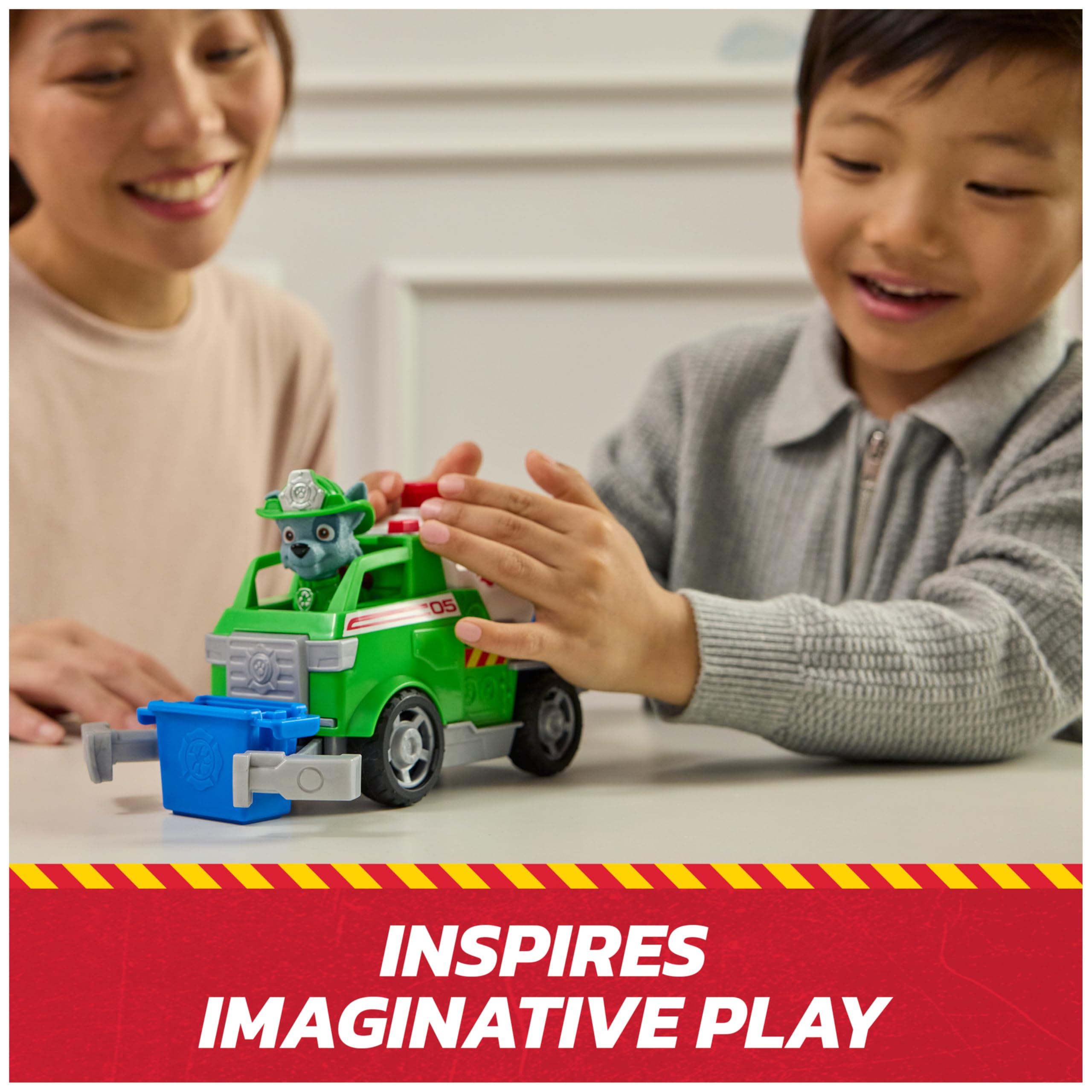PAW Patrol Rocky and tanker in action pose for storytelling.