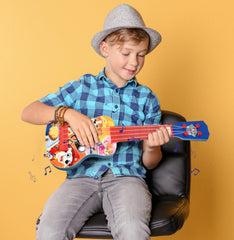 Paw Patrol ukulele in a learning session promoting practice and joy.