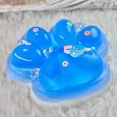 Pawfect Tail Big Taba Squishy Paw showing milky white base for soothing tactile play